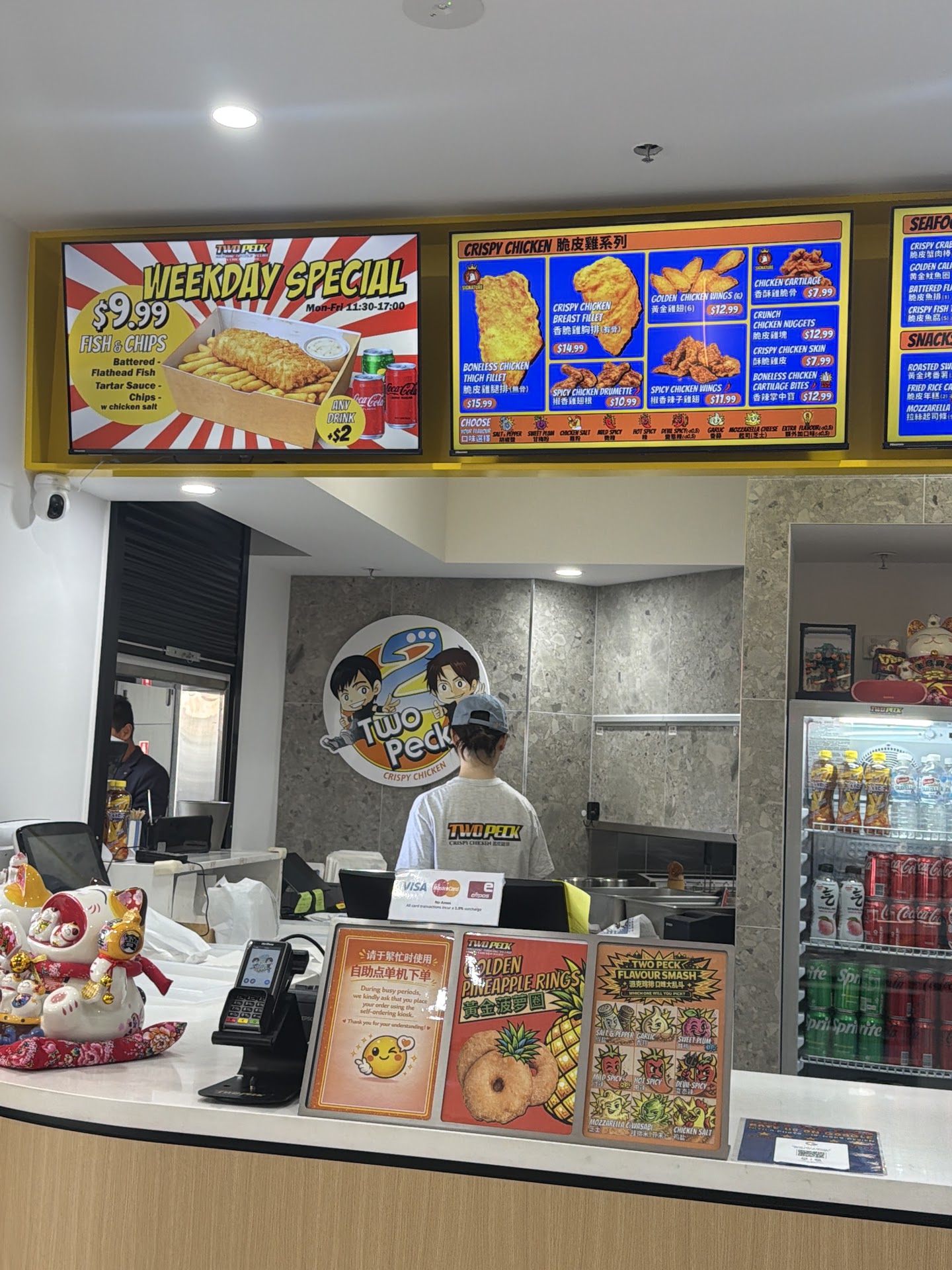Two Peck Toowong counter with menu boards and payment area