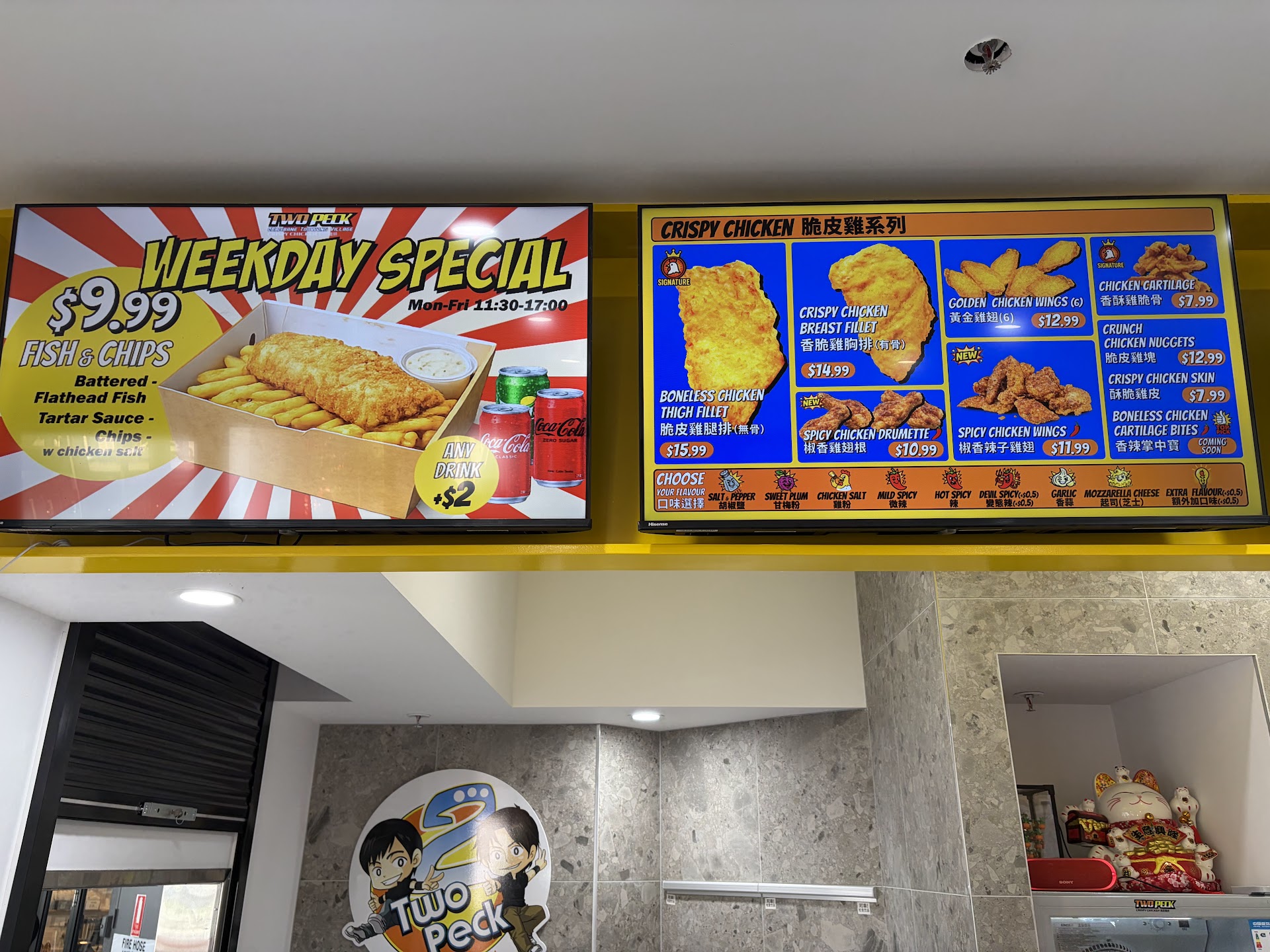 Two Peck Toowong menu boards with chicken and fish and chips special
